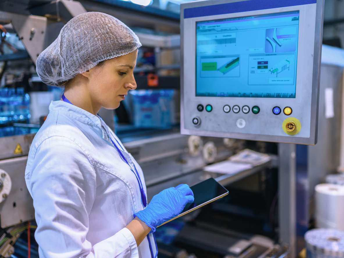 Female engineer working on maintenance in bottling plant